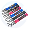 Chèques de chèques promotionnels de logo personnalisés en gros Carabiners Polyester Chaînes de clés de trèfle personnalisés de la cuite de bracelet